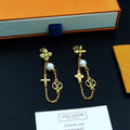 Earrings: F8