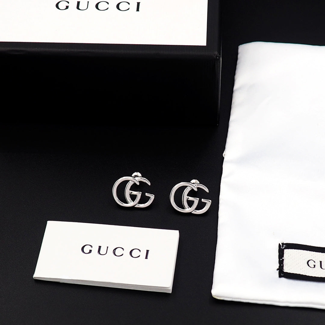 Earrings: F15