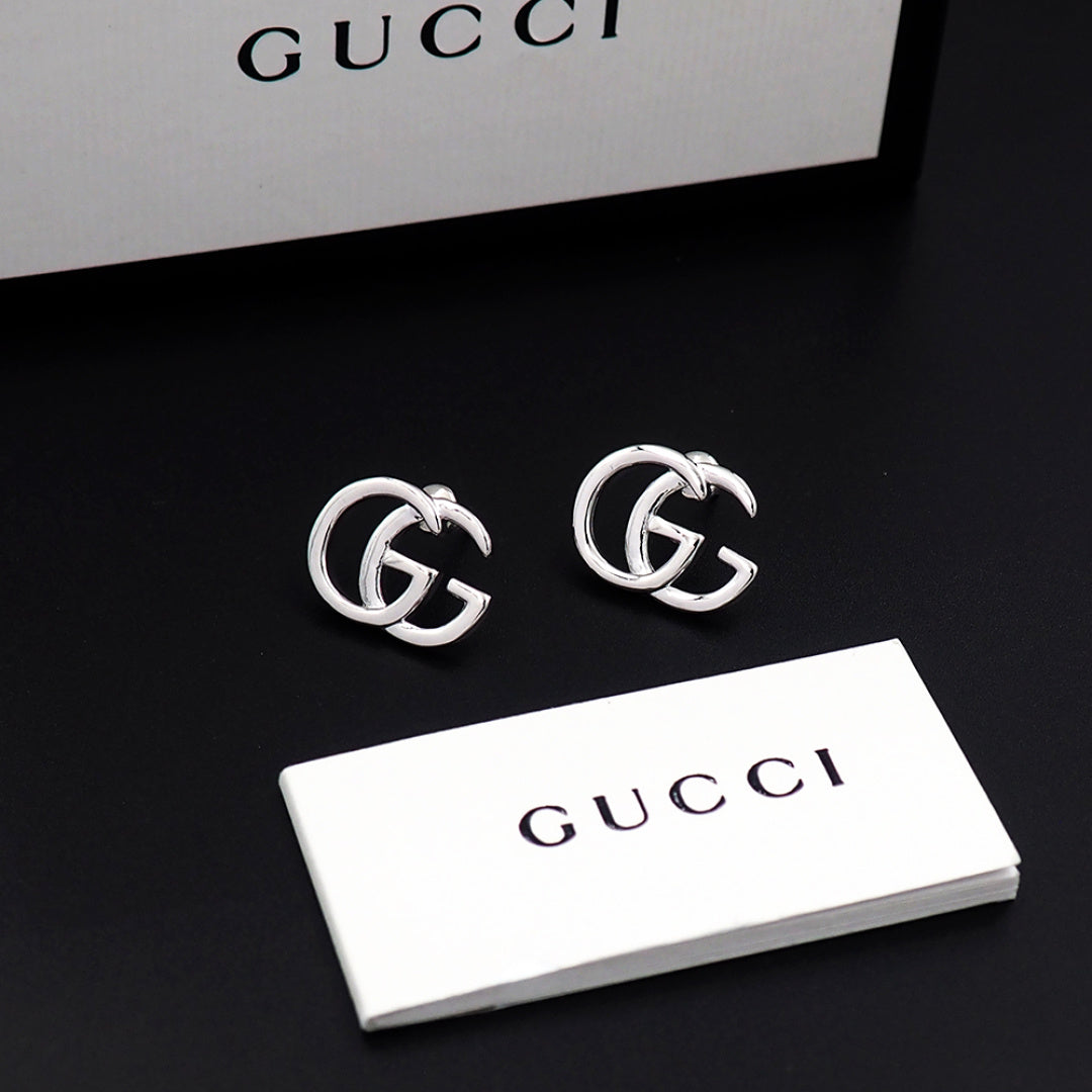 Earrings: F15