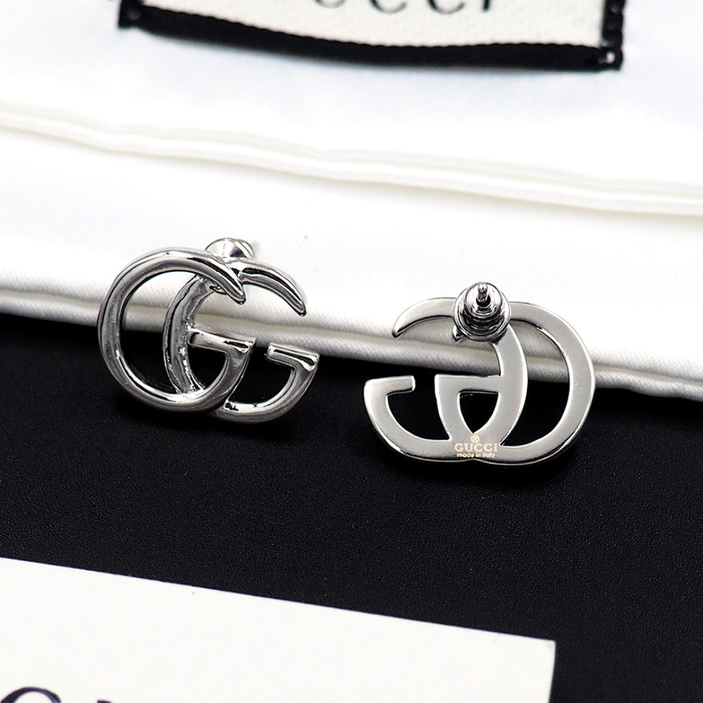Earrings: F15