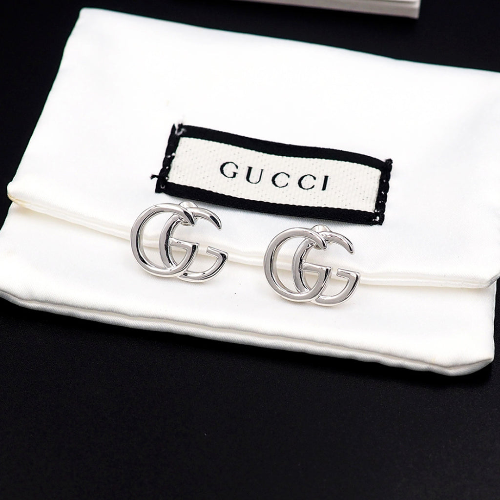 Earrings: F15
