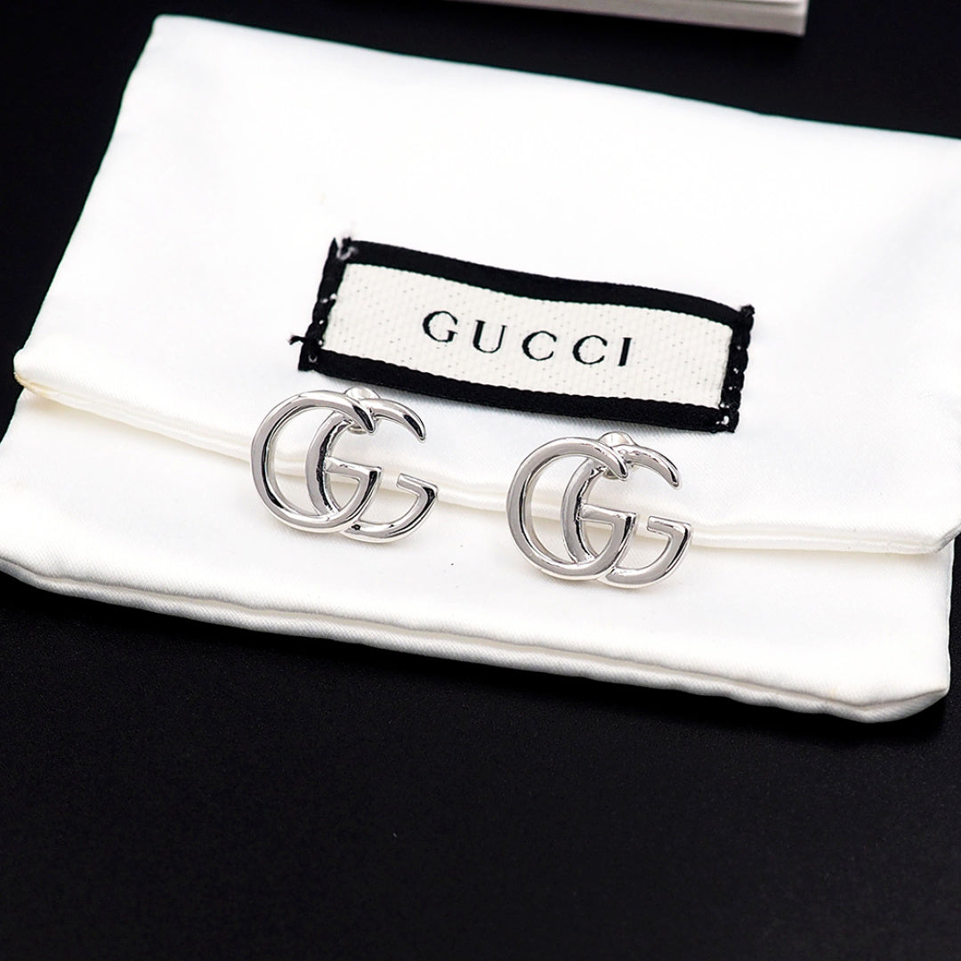 Earrings: F15