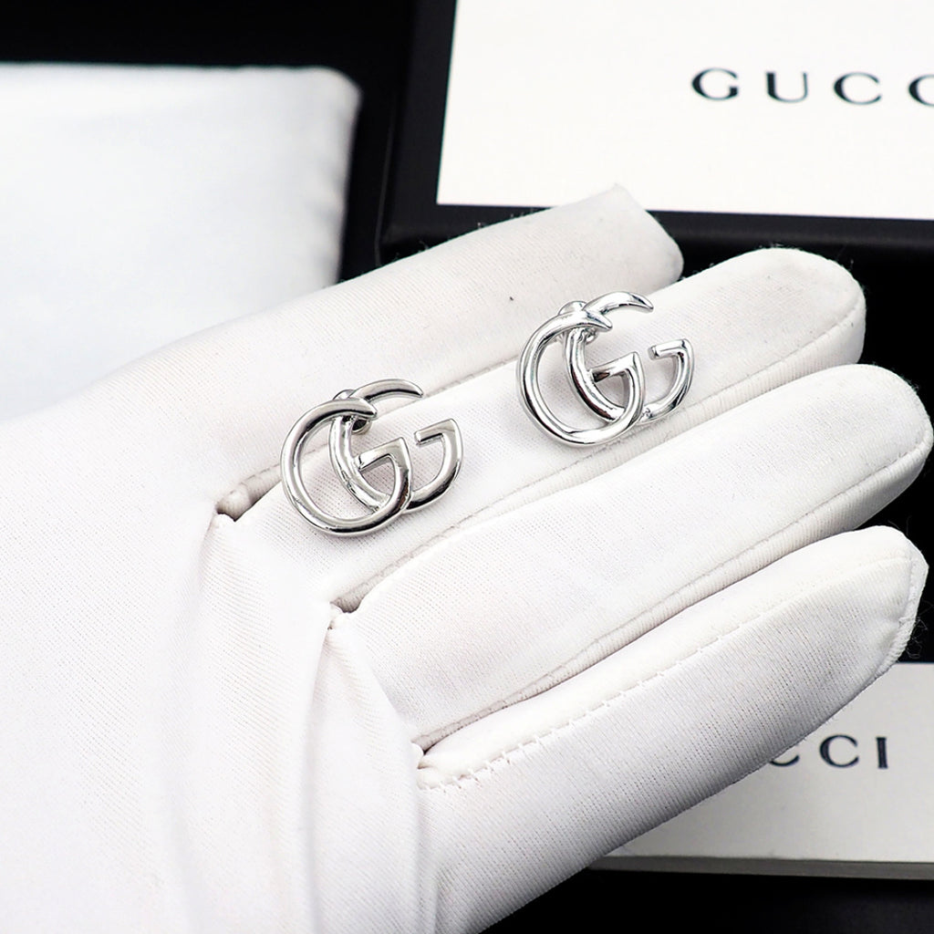 Earrings: F15