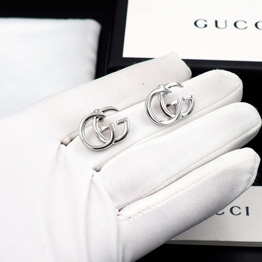 Earrings: F15
