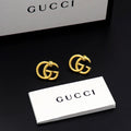 Earrings: F15